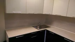 Apron and countertop for a beige kitchen photo