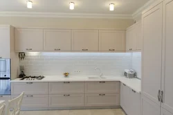Apron and countertop for a beige kitchen photo