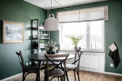 Green walls in the kitchen interior photo