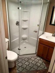 Renovation of a bathroom with shower in Khrushchev photo