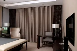 Dark curtains in the living room interior