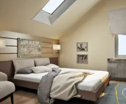 Photo of bedroom design with sloping ceiling