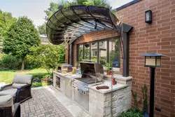 Summer kitchen for a country house photo