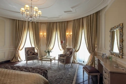 Neoclassical curtains in the interior of the living room photo