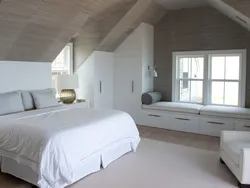 Bedroom interior photo sloping ceilings