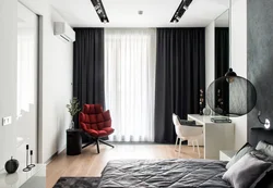 Dark curtains in the bedroom interior photo