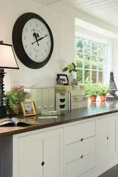Large clock in the kitchen interior