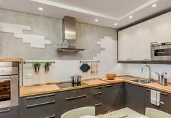 Tiled kitchen one wall photo