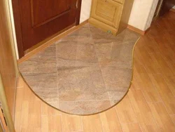 Floor design in the hallway in the apartment photo