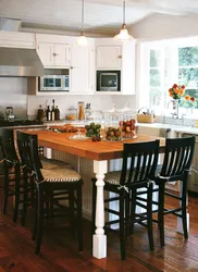 Island in the kitchen as a dining table photo