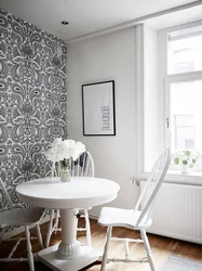 Combination of white kitchen with wallpaper photo