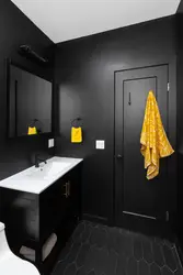 Bath with black floor and white walls photo