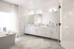 White furniture in the bathroom interior