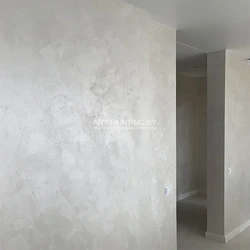Wet silk decorative plaster in the kitchen interior