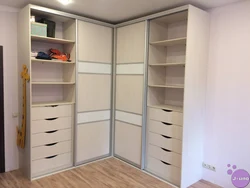 Corner wardrobe in the bedroom contents with dimensions photo