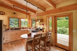 Kitchen design in a country house with a large window