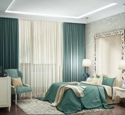 Turquoise curtains in the bedroom interior