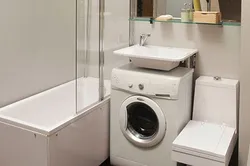 Lavabonun altında paltaryuyan maşın ilə vanna dizaynı