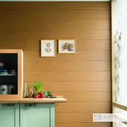 Wall made of MDF panels in the kitchen photo design