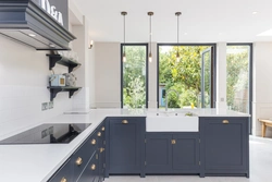 Corner kitchen design with sink by the window