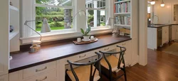 Kitchen table by the window photo design