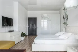 Photo of suspended ceilings in a white bedroom