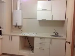 Kitchen 6 sq m design photo Khrushchev with gas water heater