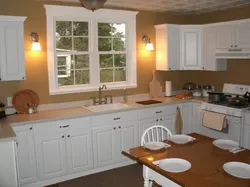 Kitchen design in a country house with a window