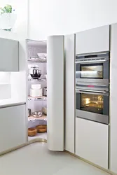 Pencil case in the kitchen with built-in appliances photo