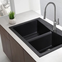 Black sink in the kitchen interior