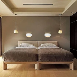 Wall lamps for the bedroom above the bed photo