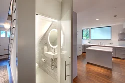 Bathroom under stairs design