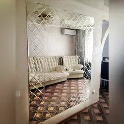 Mirror panel on the wall in the living room photo in the interior