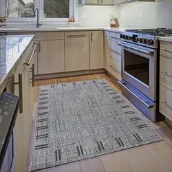 Kitchen design with carpet on the floor