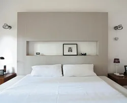 Bedroom in the niche of the room photo