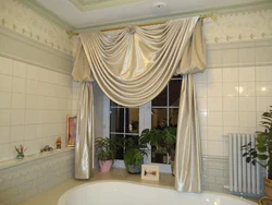 Curtains in the bathroom on the window photo