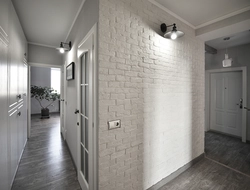 Plaster bricks on the wall in the hallway interior