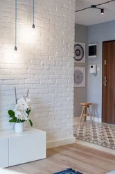 Plaster bricks on the wall in the hallway interior