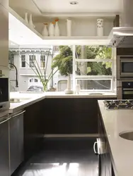 Photo of corner kitchens in a house with a window