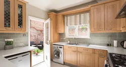 Photo of kitchen with washing machine