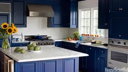Kitchen design in white and blue colors photo