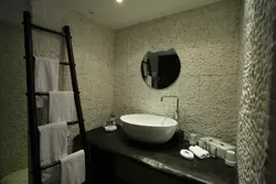 Glass wallpaper in the bathroom interior