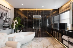 Dark marble in the bathroom interior