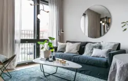 Mirrors in the living room design above the sofa photo