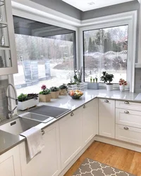 Corner kitchen design with window in apartment