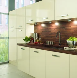 Kitchen with wooden countertop in beige interior