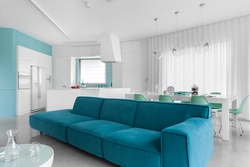 Turquoise sofa in the kitchen interior