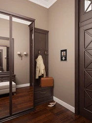 Hallway interior with brown furniture