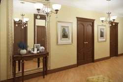 Hallway interior with brown furniture