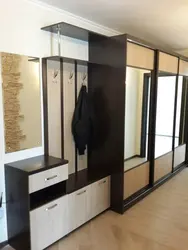 Cabinets in a narrow hallway in the corridor photo